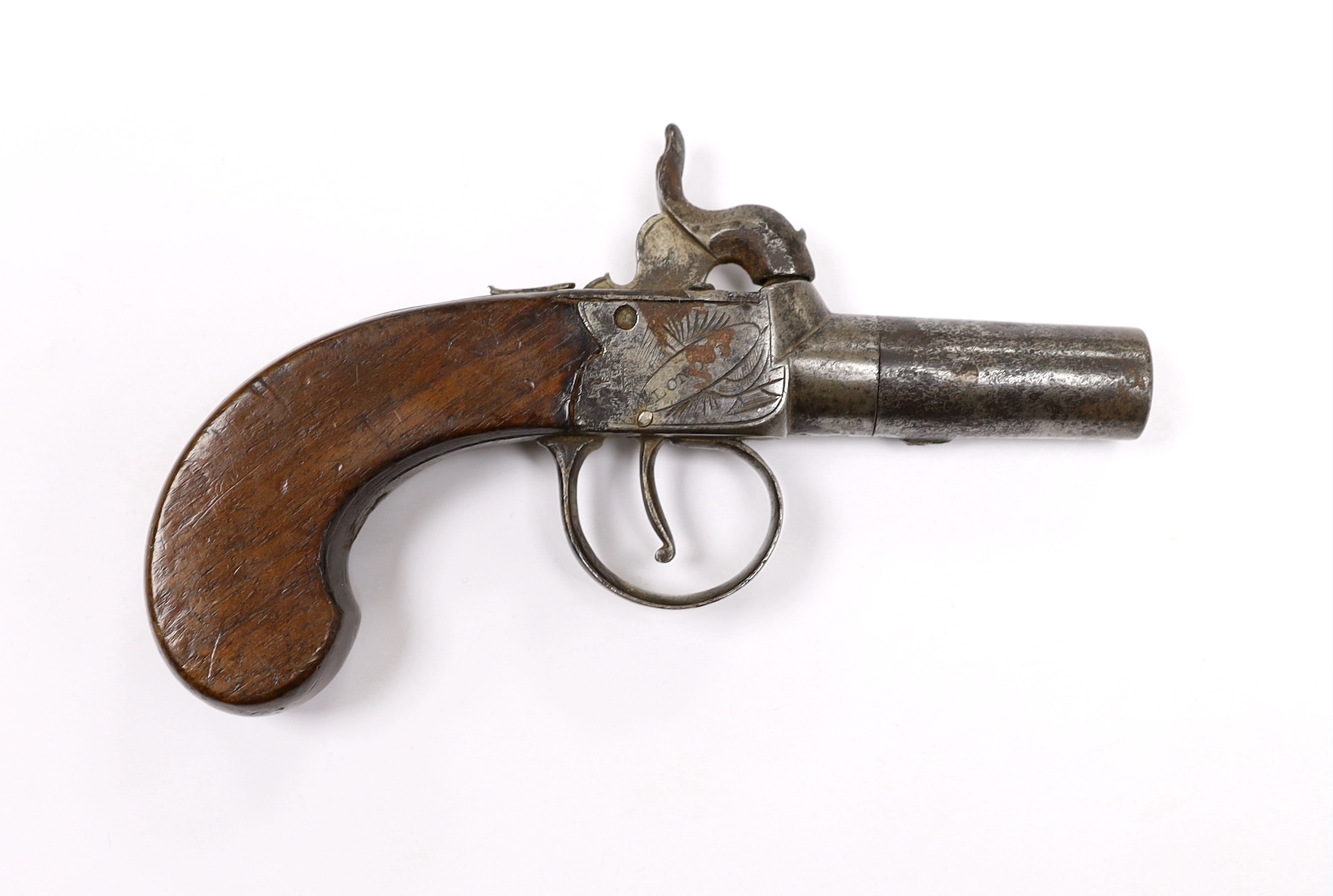 A 19th century box lock percussion pocket pistol with turn off barrel, engraved frame slab and walnut grip, barrel 4.2cm